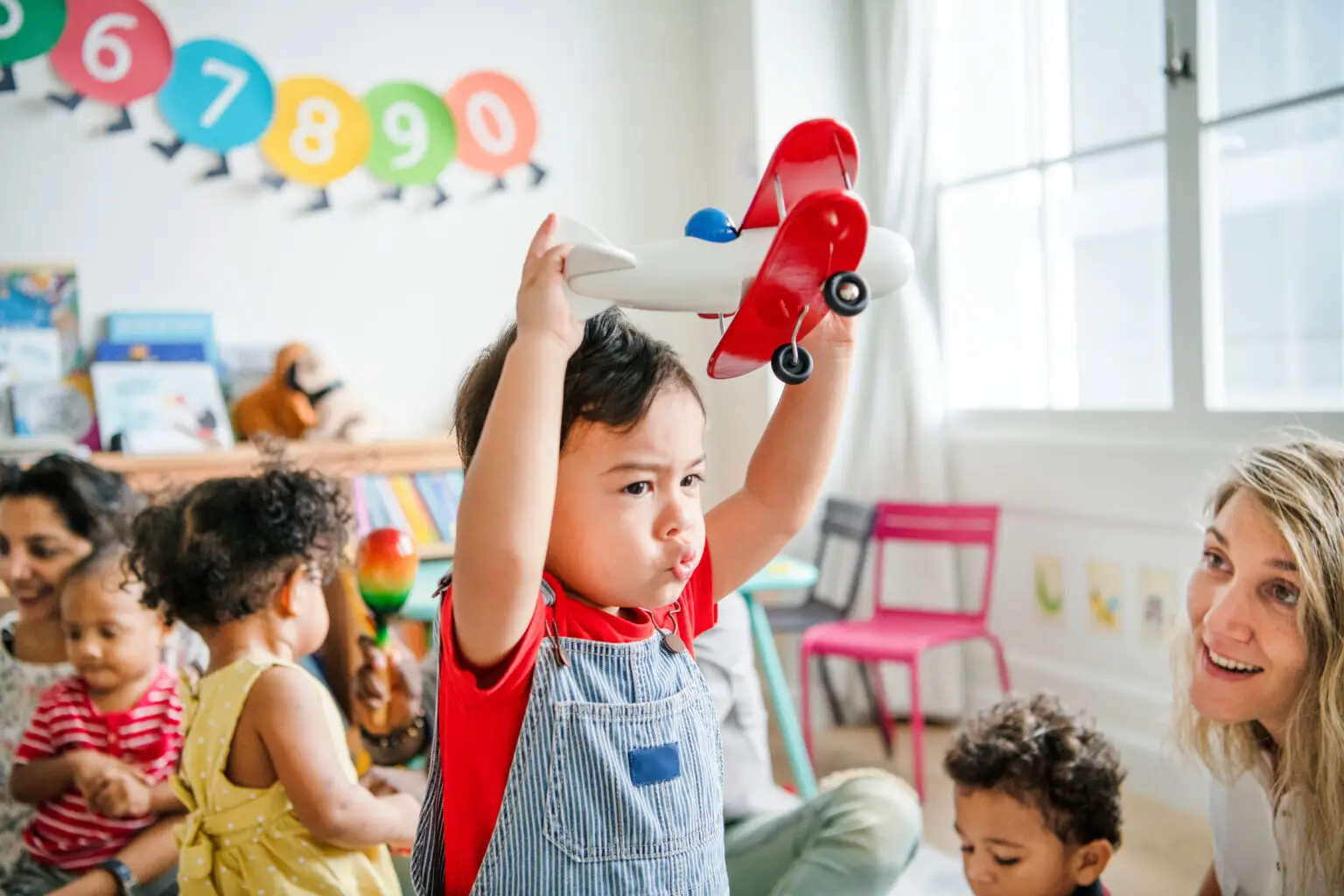 Preschooler,Enjoying,Playing,With,His,Airplane,Toy