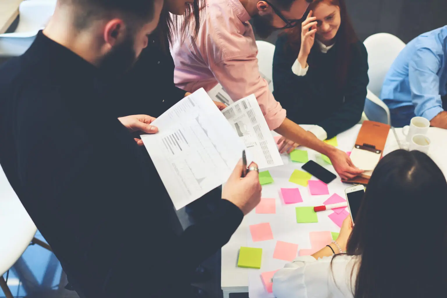 Teacher,In,Business,School,Checking,Coursework,Of,Student,Reading,Information